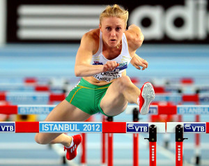 TO GO WITH OLY-2012-AUS-PREVIEW feature by ROBERT SMITH (FILES) This file photo taken on March 10, 2012 shows Australia's Sally Pearson competing in heat 1 during the women's 60m hurdles semi-final at the 2012 IAAF World Indoor Athletics Championships at the Atakoy Athletics Arena in Istanbul. Australia are banking on their swimmers and ace cyclists as they aim to punch above their weight yet again at the London Olympics with a target of 15 golds and a top-five spot on the medals table. AFP PHOTO / FILES / GABRIEL BOUYSGABRIEL BOUYS/AFP/GettyImages ORG XMIT:
