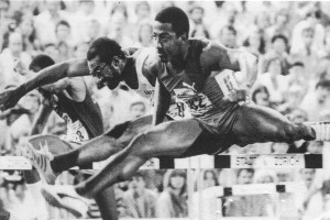 From the cover of The Hurdler's Bible, Nehemiah on his way to a world record over Foster.